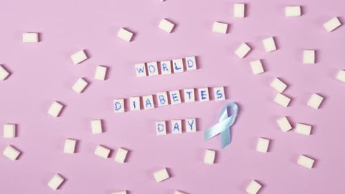 Sugar Cubes Spell World Diabetes Day with Ribbon