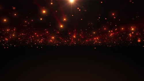 Fondo colorido abstracto con partículas voladoras brillantes de oro o naranja que emiten rayos