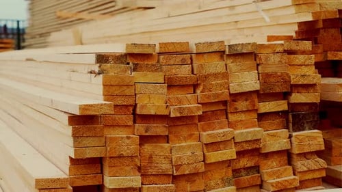 Stacked Lumber in Sunlight
