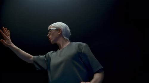 Young Man Interacting with Futuristic Holographic Interface