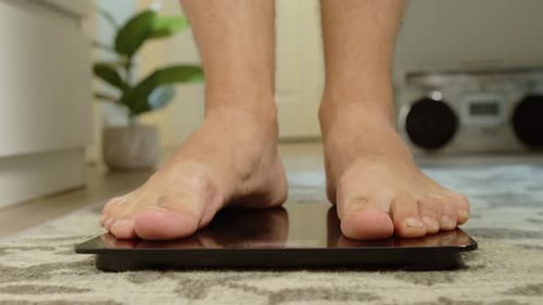 Bare Feet Step on Digital Scale for Weight Check