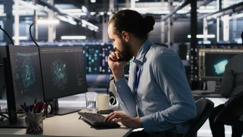 Data Center System Administrator Talking with Coworker in Office