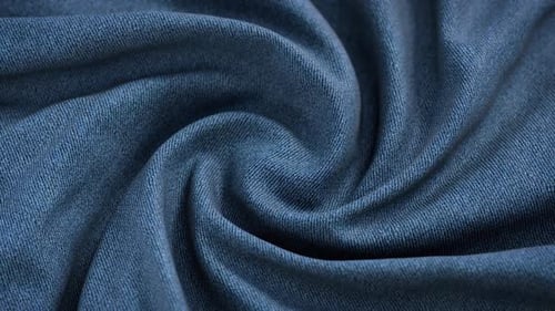 Elegant Abstract Blue Fabric Swirling Texture