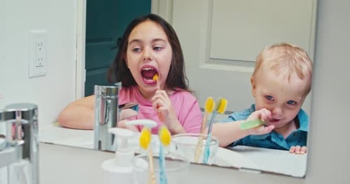 Cheerful Children Brush Their Teeth in the Morning and in the Evening