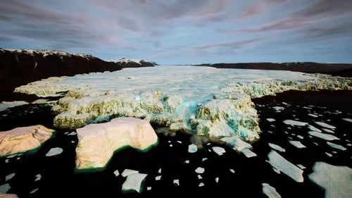 Aerial Drone View of Massive Arctic Glacier and Floating Icebergs