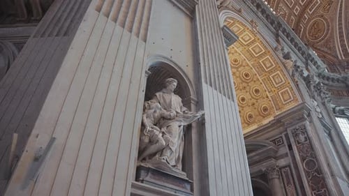 A stunning interior view of St. Peter’s Basilica in the Vatican, showcasing its ornate dome, marble