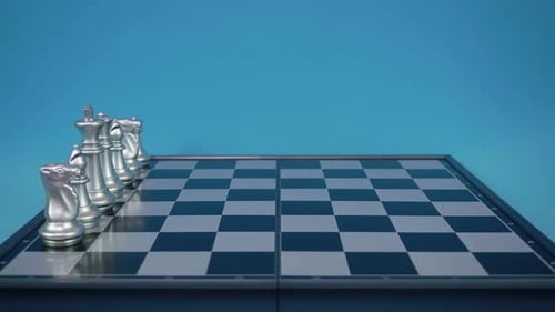 Silver and Gold Chess Pieces on Chessboard