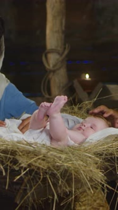 Mary and Joseph Admiring Son of God