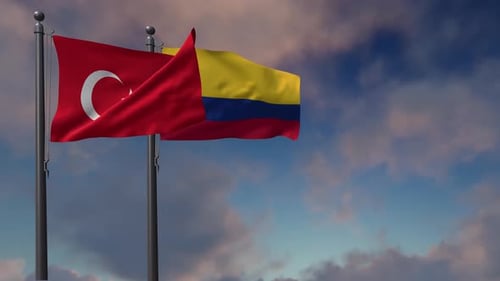 Turkey and Colombia National Flags Waving Against Blue Sky