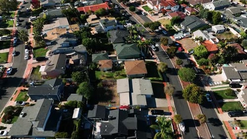 Aerial view of San Clemente coastline city with nice luxury and wealthy homes before sunset time. Be