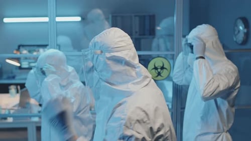 Scientists Preparing to Work in Clean Laboratory