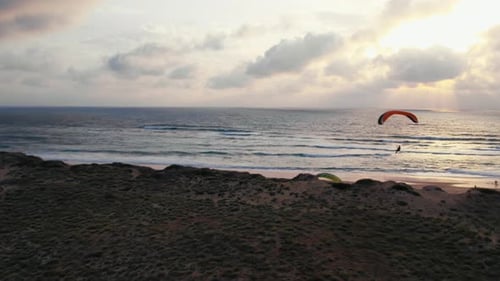 Paragliders Explore Sunset Sky