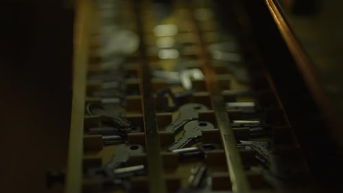 Discover an Old Vintage Key Collection in a Wooden Drawer Up Close Featuring Intriguing Shadows