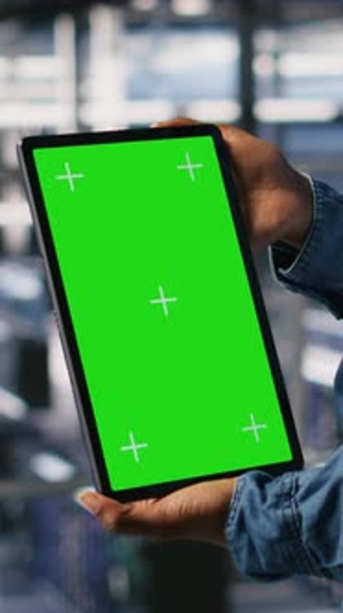 Vertical Video Data Center Worker Using Green Screen Mockup Tablet Doing Maintenance Closeup