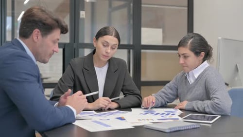 Business Team Meeting to Discuss Strategy