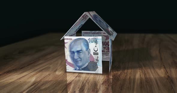 Turkish Lira 100 TRY money banknotes paper house on the table ...