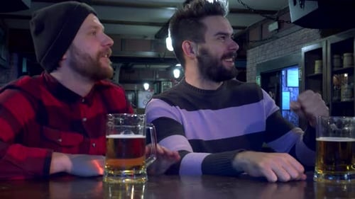 Excited Friends Cheer Passionately at the Pub
