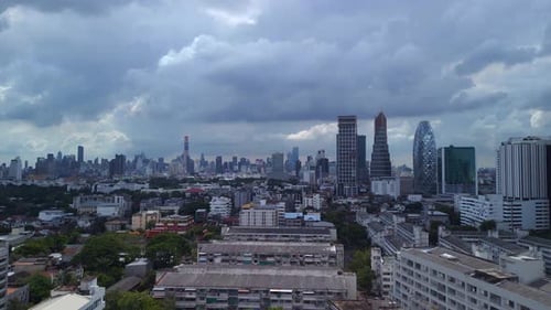 Suburban buildings in the background cloudy skyscrapers and sky line of the city Unbelievable aerial
