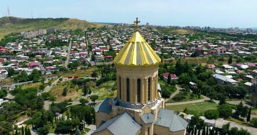 Aerial Top View Of Holy Trinity Tsminda Sameba Cathedral In Tbilisi, Georgia.