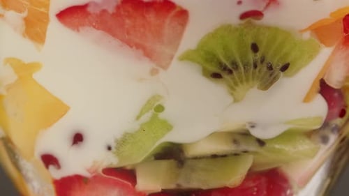 Bright Fruit Cocktail with Yogurt Close Up