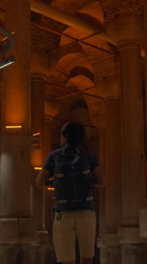 A Young Woman Tours the Ancient Cisterna of Istanbul an Underground Marvel Once Filled with Fresh