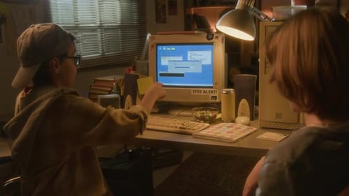 Children Using Old Computer in a Bedroom