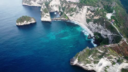 Atuh Cliff, Diamond Beach, And Batumategan Island In Nusa Penida, Bali, Indonesia. aerial shot