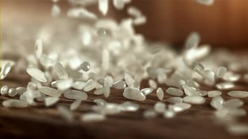 Rice Falls on the Table Filmed on a Highspeed Camera at 1000 Fps