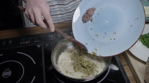 Prepare a mixture of Cafe de Paris butter and spices in the pan, enhancing the flavor of the meat sa