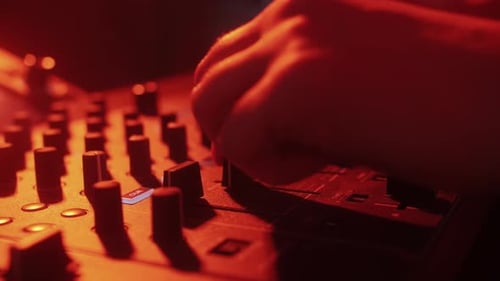 DJ Playing Music on Festival in Night Club Techno Musician with Headphones and Sunglasses Performing