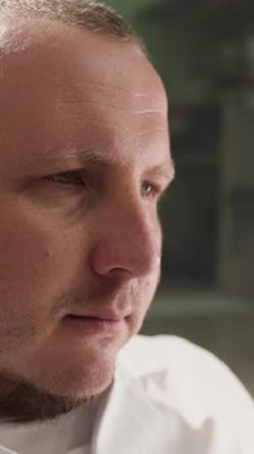 Close Up of Adult in White Coat