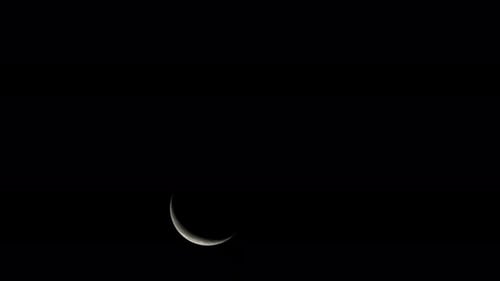 Crescent Moon Ascending in Night Sky, New Taipei City.