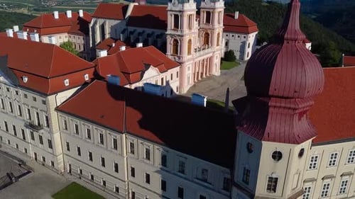 Majestic aerial shot of a monastery in Austria surrounded by trees. Göttweig Abbey