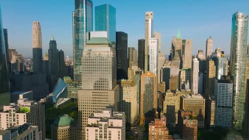 Diverse buildings and skyscrapers of Lower Manhattan Financial District in the sun light.