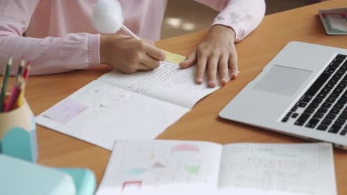 School Girl Student Distance Learning, Remote Studying Online At Home Using Laptop Computer, Writ...