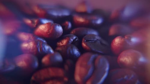 Abstract Coffee beans extreme closeup dolly shot orange and blue colorful light