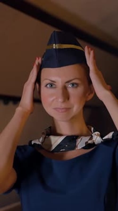 Attractive Flight Attendant Gives Safety Instructions