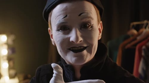 Mime Looking at Camera with White Gloves