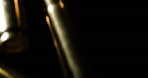 Abstract Golden Light Patterns on Black Background