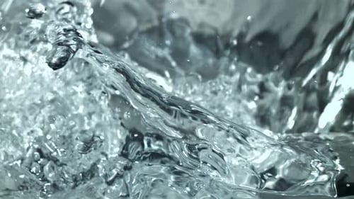 Refreshing Close Up of Pouring Water with Bubbles