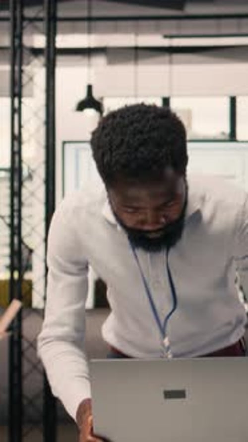 Vertical Video Black Professional Reviewing Resource Allocation and Performance Metrics