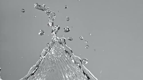 Splashes of Water on a Light Background Filmed on a Highspeed Camera at 1000 Fps