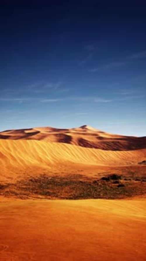 Desert Landscape With Sand Dunes and Blue Sky