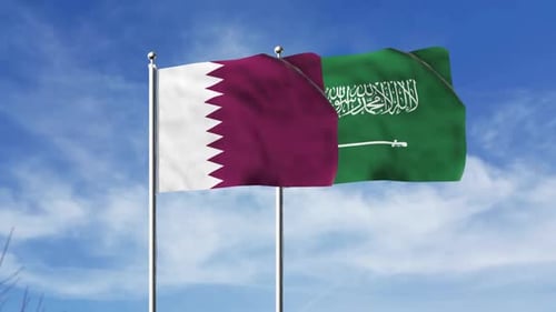 Waving Flags of Qatar and Saudi Arabia