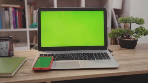 On Tablet Laptop Computer with Green Screen Chroma Key Display Internet Business Office Technology