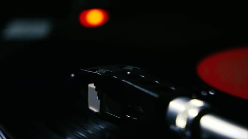 Record Player Spinning Vinyl Close Up at Night