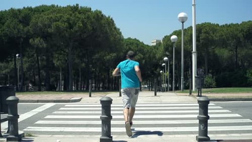 Young Man Jogging, Crossing Zebra in City, Super 240