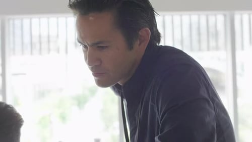 Businessmen Talking Planning Together In Office