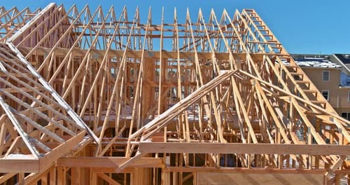 Wooden Framework of Suburban House Under Construction