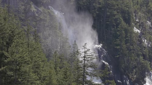 Waterfall Running Down the Mountain in Canadian Nature Landscape Aerial Cinematic Pan